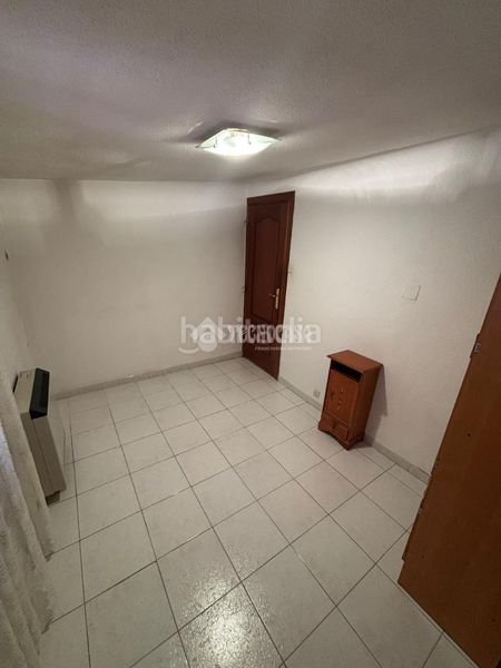 Foto c01284fd-6077-4c0a-9971-56f2d984f409. Casa aparellada a Entrevías Madrid