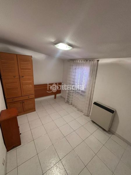 Foto c3619356-9aed-42a3-8373-124a9972212e. Casa aparellada a Entrevías Madrid