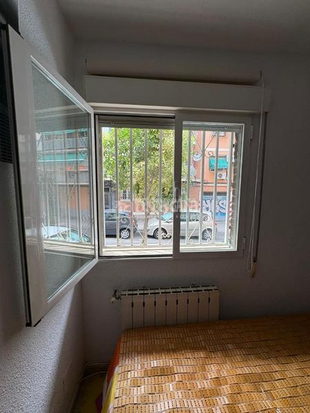 Foto 12908388-1525-4c9a-88c2-5bd399f79df7. Piso  en venta en Palomeras Bajas Madrid