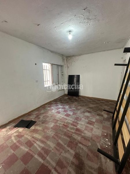 Foto 02a719a9-fb98-4ecf-b653-1e5f508d1185. Casa aparellada a El Cerro Sevilla