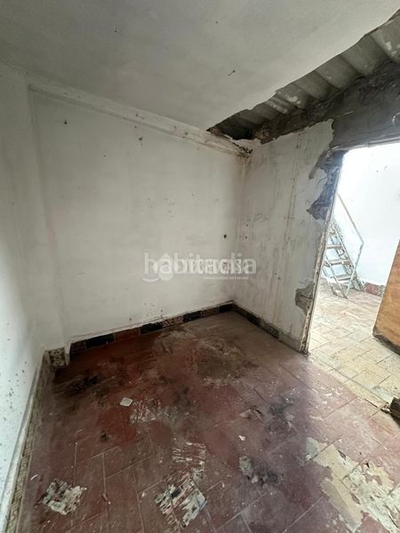 Foto 34acb958-01ad-44b9-91c6-5bef1fbb2783. Casa aparellada a El Cerro Sevilla