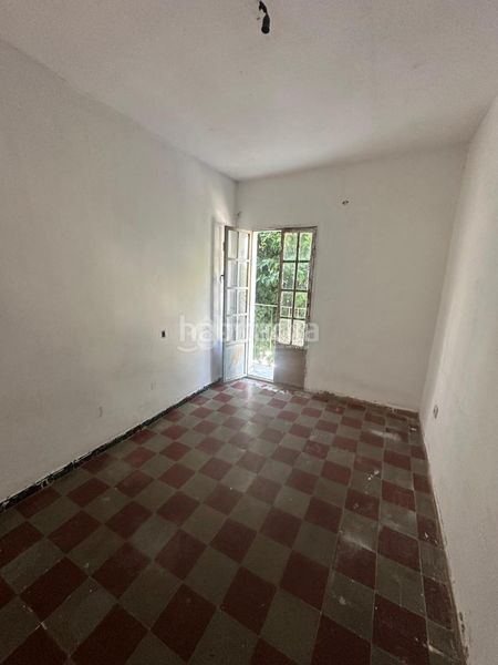 Foto 44edb690-c0e3-4214-bc13-3e5ec58a6522. Casa aparellada a El Cerro Sevilla