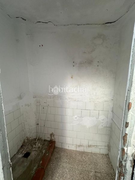 Foto 594c2c58-68b5-4887-90d5-f8400b1ef179. Casa aparellada a El Cerro Sevilla