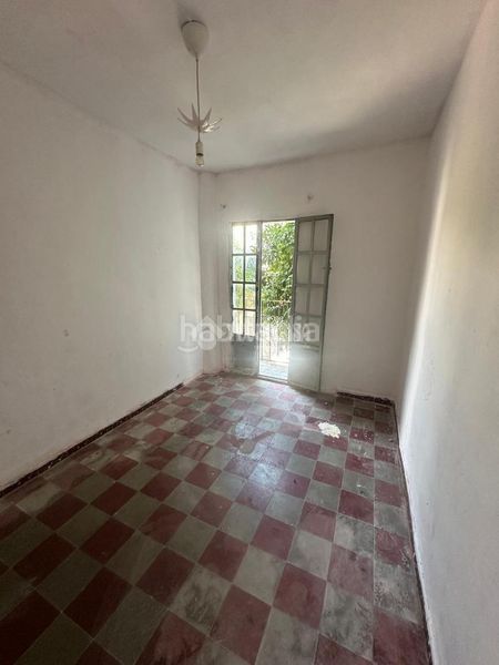 Foto c28ee30d-a5e4-4d62-bf8a-be5fc5dccb04. Casa aparellada a El Cerro Sevilla
