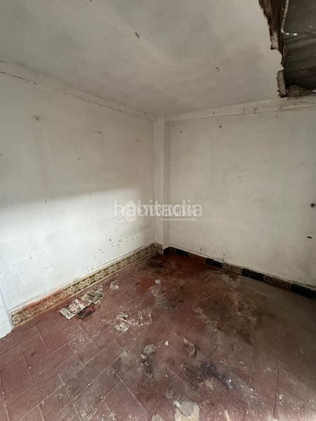 Foto c944a01a-6dae-4c02-8c26-ec6da10f05fa. Casa aparellada a El Cerro Sevilla