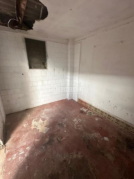 Foto d23d8869-c66d-410d-b9a5-9a5d436a626b. Casa aparellada a El Cerro Sevilla