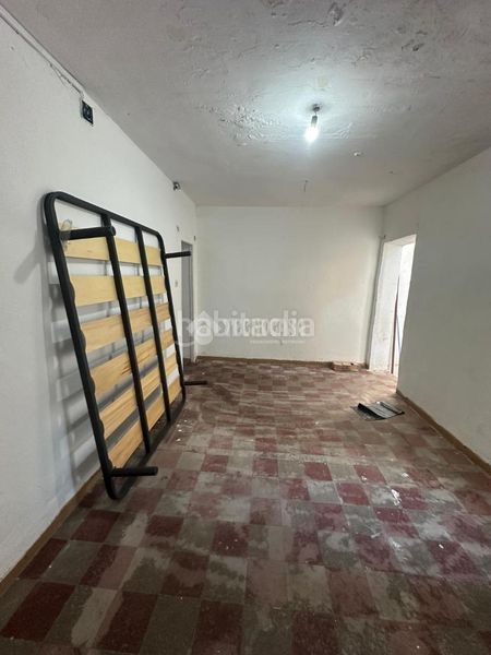 Foto ecc995bc-8aad-49f0-812a-dc507206505d. Casa aparellada a El Cerro Sevilla