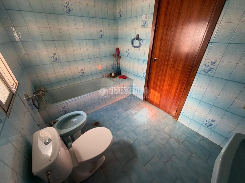 Foto c52e1e6b-7bb6-4670-89a0-32782914b816. Casa aparellada a Bailén
