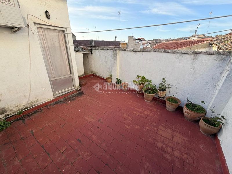 Foto 10ece14a-7408-4c4b-861c-f14f7b93f0bc. Casa aparellada a Bailén
