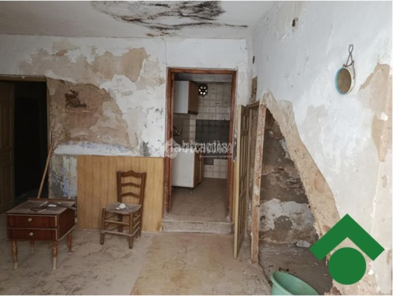 Foto fa2be530-8323-4ce2-af64-b0d575640b6b. Casa aparellada a Dílar
