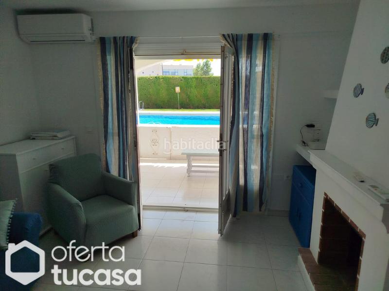 Foto 2426b301-6744-46d1-af34-f965aa1bbbf0. Alquiler piso bajo con terraza a la piscina, garaje y chimenea en Mojácar