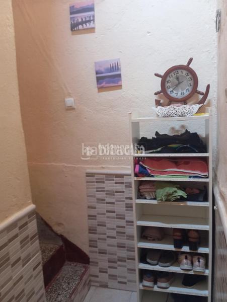 Foto 1a0f4ce7-2c50-44a5-bab6-90d82605a7e9. Casa aparellada a Lora del Río