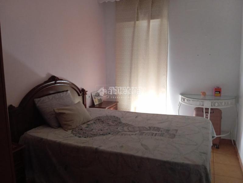 Foto 3333d3de-5836-40ed-9d6f-483ada879d26. Casa aparellada a Lora del Río