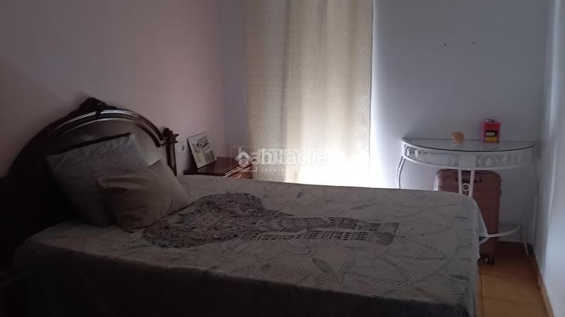 Foto 6b93a721-639f-4e65-bd56-43b3ff72b00e. Casa aparellada a Lora del Río