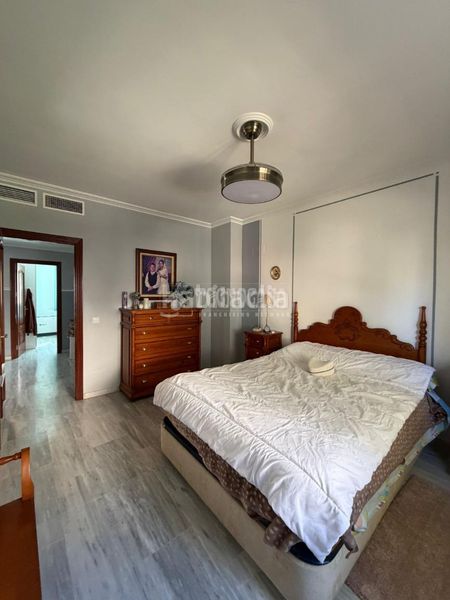 Foto 05c7c99f-3fa7-4300-bf5f-f7ac546f5a25. Casa aparellada amb calefacció a El Junquillo - Vistalegre Utrera