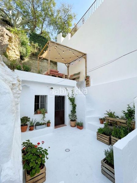 Foto d9d10419-ade1-47fd-8a04-f68576239806. Casa aparellada a Arcos de la Frontera