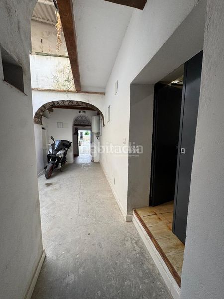 Foto a2b64ff8-d022-4386-ace9-948ccfd340ab. Casa aparellada a Arcos de la Frontera