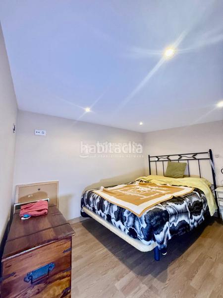 Foto 41a1ee21-38ec-4ba2-b80e-ad28e23df981. Casa aparellada amb calefacció a Palomeras Sureste Madrid