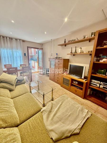 Foto 8646dd4a-9104-494d-8525-b6e673ac0142. Casa aparellada amb calefacció a Palomeras Sureste Madrid