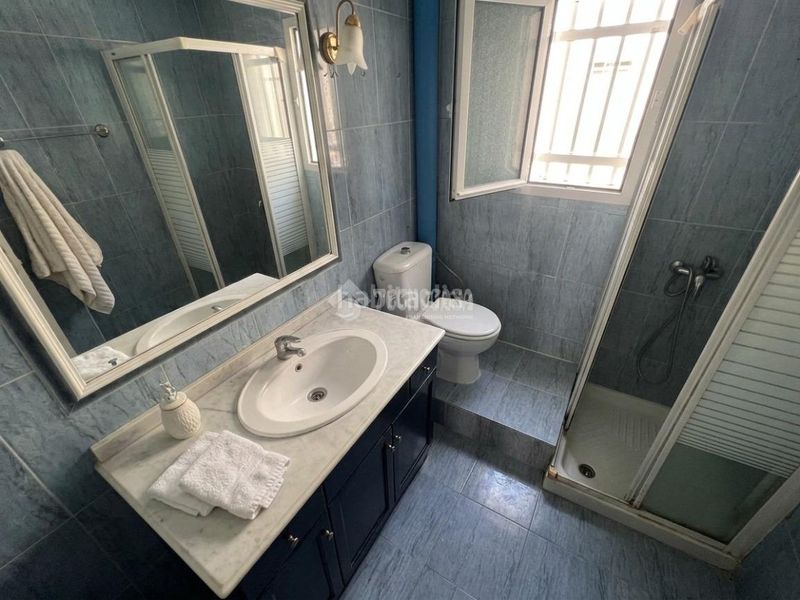 Foto a88bba3f-f6a1-44a9-96fa-d4862b656d4a. Casa aparellada a puerto de Estepona Estepona