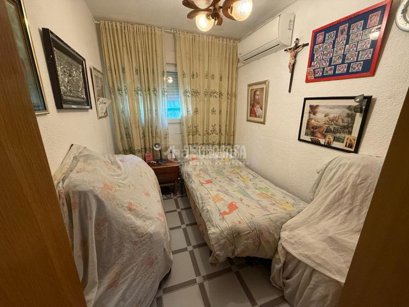 Foto 8e8d1ed7-d789-45b1-b956-9349dea32a25. Casa aparellada a Orcasitas Madrid