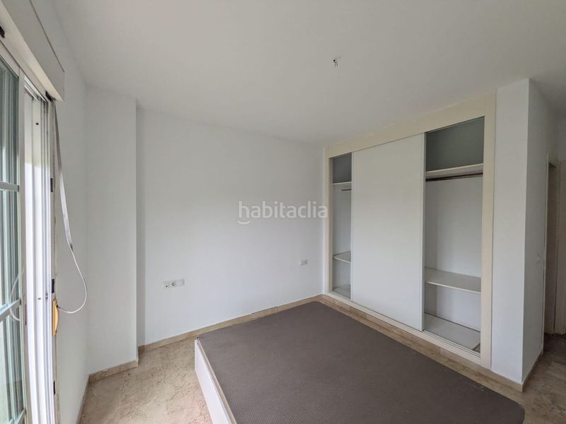 Foto 656627a2-211f-4a2b-aba4-7313c2c8f600. Casa adossada amb aparcament a Aznalcázar