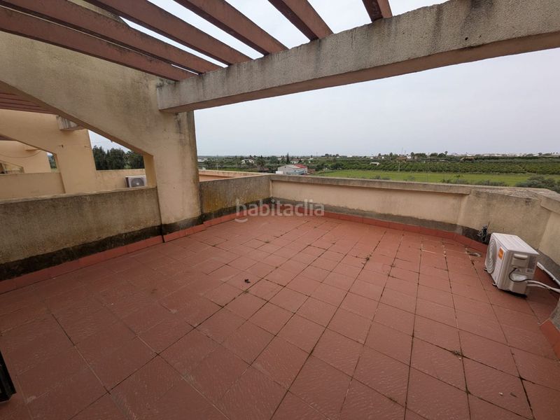 Foto a15dfd3b-6974-4801-965a-df9303597a66. Casa adossada amb aparcament a Aznalcázar