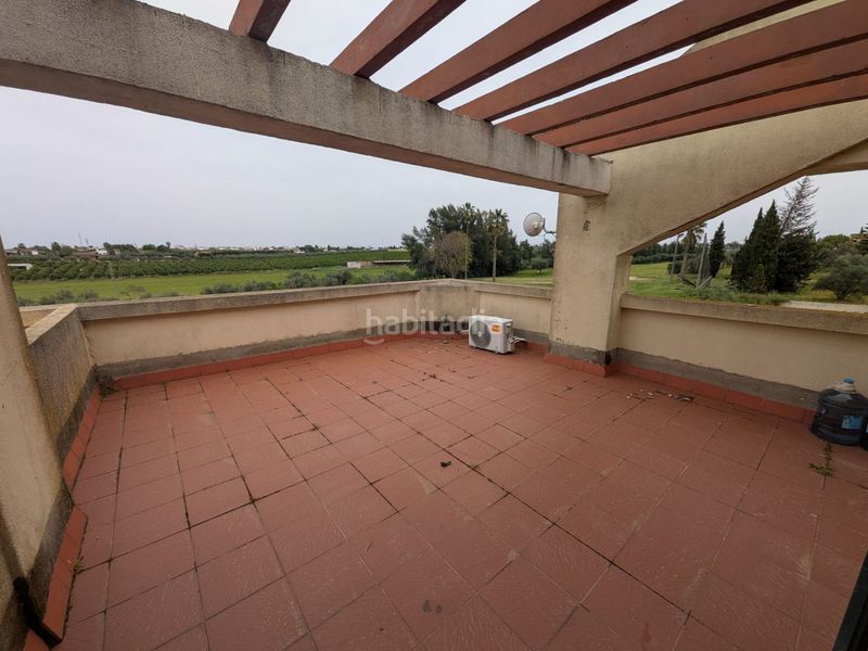 Foto cc5798b7-67e5-4fb2-af95-6471df417340. Casa adossada amb aparcament a Aznalcázar