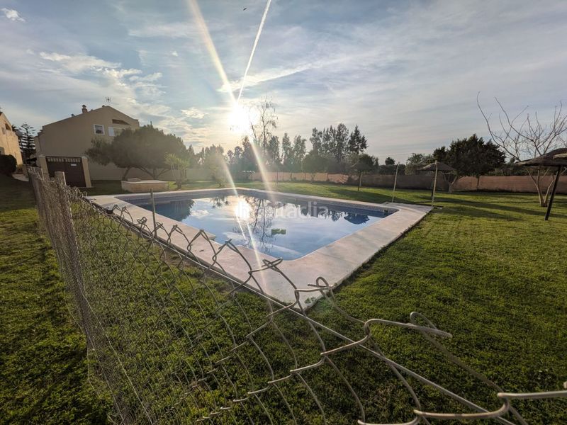 Foto d7799a54-ecdc-45f8-80b0-fad552887c01. Casa adossada amb aparcament a Aznalcázar