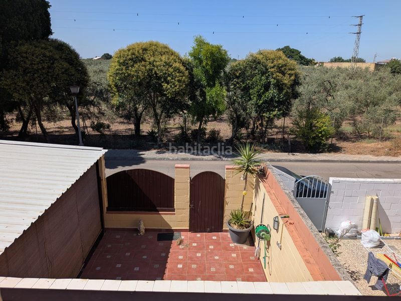 Foto 4011ce56-8019-4298-94d2-10dda1bd5ab0. Casa adossada amb aparcament a Benacazón
