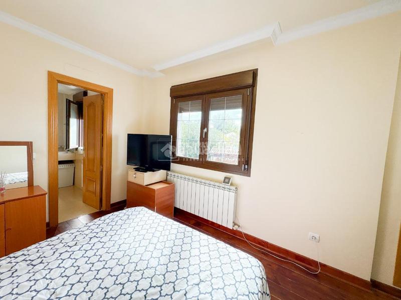 Foto bea1ed24-789b-4bc3-8bc1-e586958f2ca8. Casa aparellada amb calefacció aparcament a El Pijorro Navalcarnero