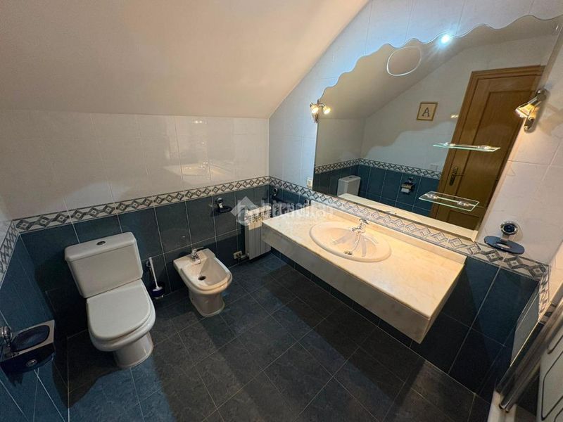 Foto bb342019-f17d-45fb-b8da-299766201802. Casa aparellada amb aparcament a Santa Isabel Zaragoza