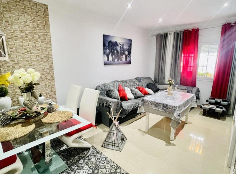 Foto 08221fa9-2ca3-4e65-a84f-946994a6fa3a. Casa aparellada amb aparcament a Mollina