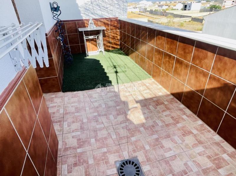 Foto 77b62d14-1260-4a59-93eb-24b9b6c14e8b. Casa aparellada amb aparcament a Mollina