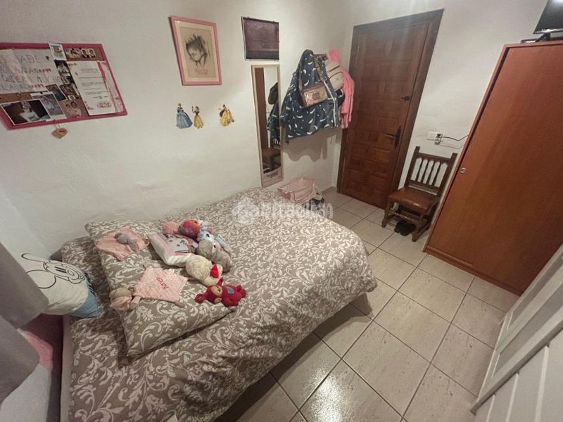Foto 56f5a1a7-e658-45c3-9fd2-9e1692fb68b0. Casa aparellada a Zona de la Vega Antequera