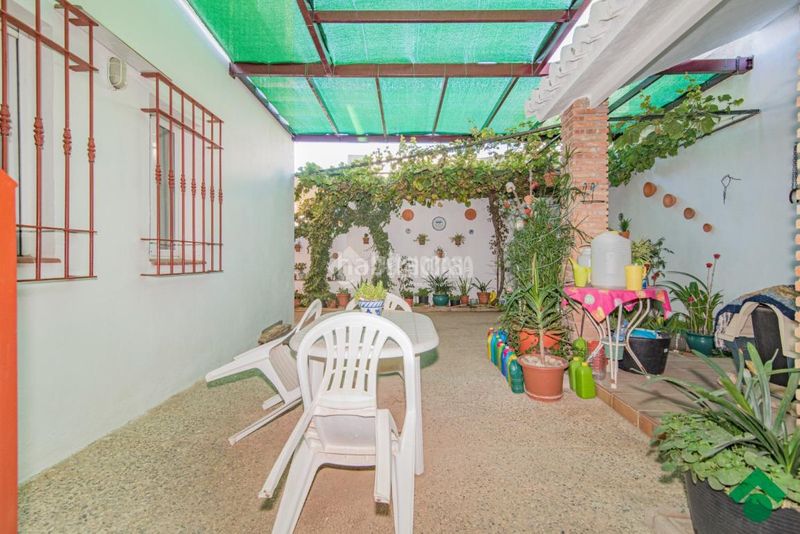 Foto 4e695b80-ff90-45d4-b799-dde6af277e97. Casa aparellada amb aparcament a Haza Grande Granada