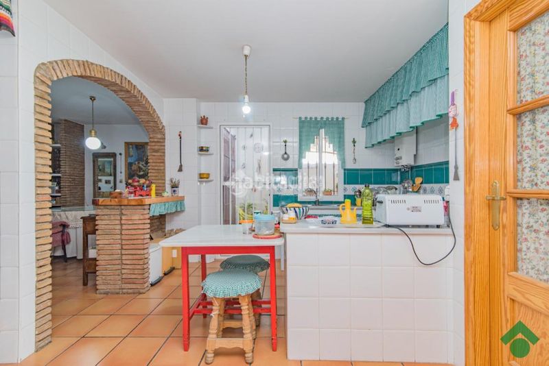 Foto a6cf8268-0001-4626-83b3-20749117471d. Casa aparellada amb aparcament a Haza Grande Granada