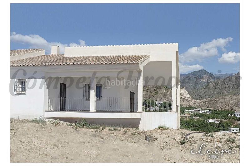 Foto 585cce2b-2f7e-487a-ba4e-38859dcc9f45. Casa amb aparcament a Frigiliana