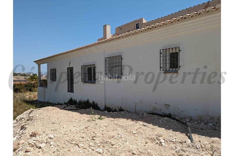 Foto a0a45c9f-8180-4e80-9516-80251a2b37a7. Casa amb aparcament a Frigiliana