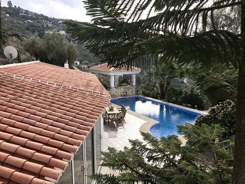 Foto d08e14f1-61bf-45b0-99c5-04aa8bb3fe2b. Wohngrundstück in Sayalonga