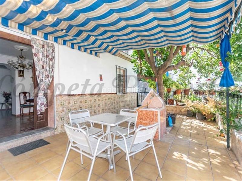 Foto 7296d7a7-c6cd-41f8-b0dd-823b8519f854. Casa adossada amb calefacció a Cómpeta