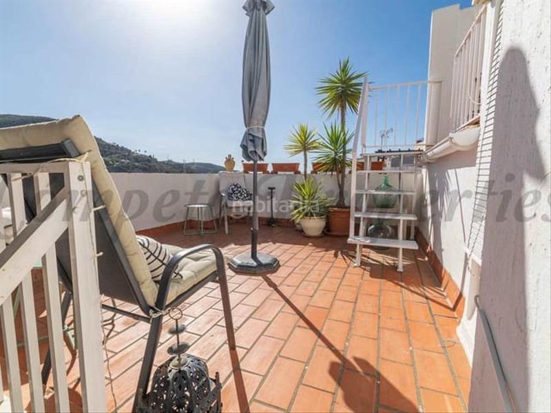Foto 91ba9d54-5a35-4ab8-b03c-0d6b739aca1c. Semi detached house with heating in Torrox pueblo Torrox