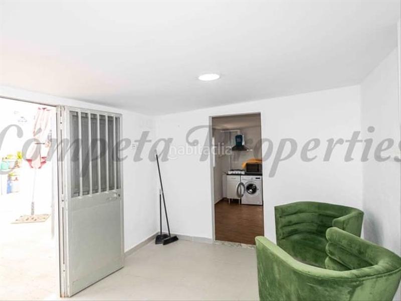Foto 3f1eb445-f03e-4e37-bdd0-263cf60700ea. Semi detached house with heating in Torrox pueblo Torrox
