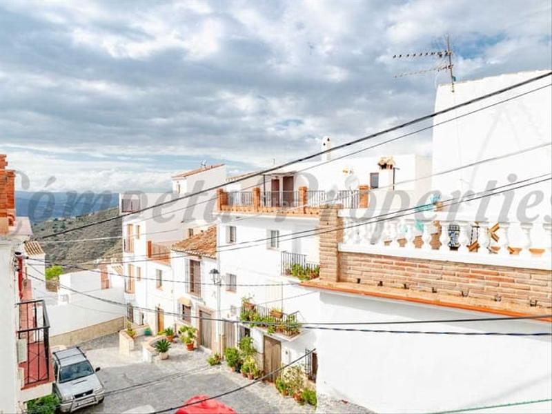 Foto 1973a753-5691-41be-8fa9-c3b7721cb76f. Casa adosada en Canillas de Aceituno