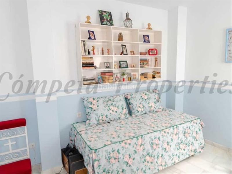 Foto f05a492c-36e2-4efc-b8eb-cd12419c78ab. Casa adossada amb calefacció a Cómpeta