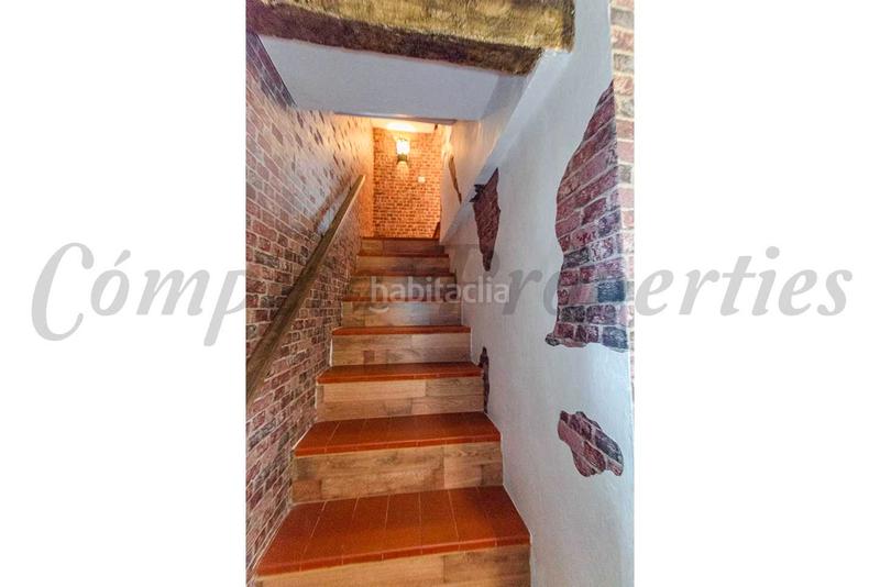 Foto be1eb5d2-55af-4012-92bb-c06e806dc54f. Casa adossada a Cómpeta