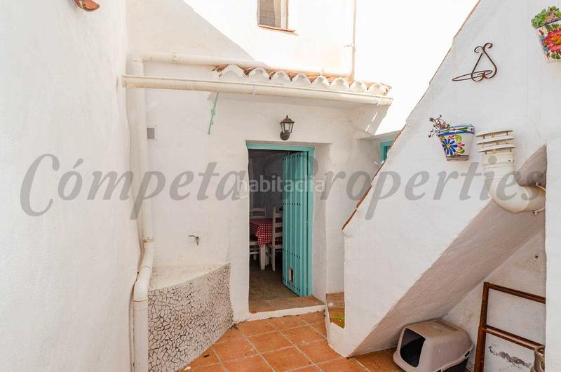 Foto cc364097-12b2-48ce-82d2-2f9ed6943d82. Casa adossada a Cómpeta