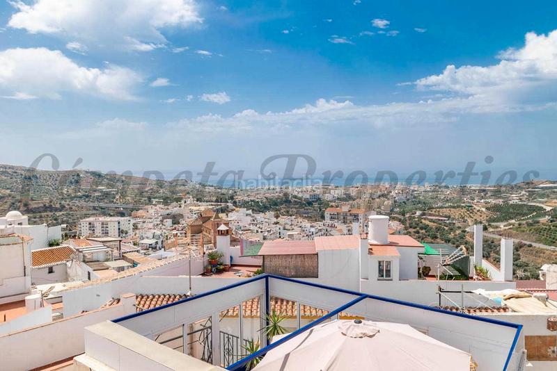 Foto 1d1bc6b6-971f-48f9-a3df-070b23f0dbe6. Casa adosada impresionante casa de pueblo con vistas al mar en Torrox