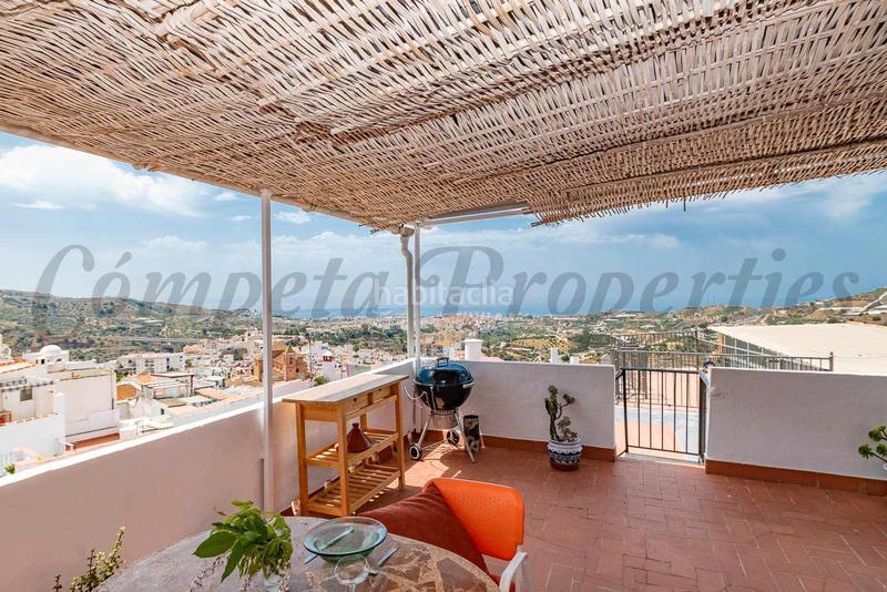Foto 5bd6f78d-f2db-4af6-a276-2a38a81ac028. Casa adosada impresionante casa de pueblo con vistas al mar en Torrox
