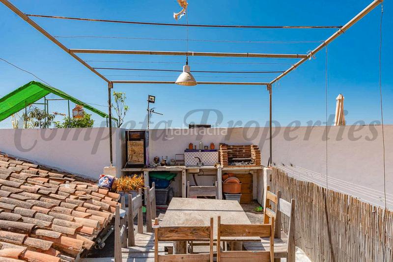 Foto 0245282b-570d-44ea-8d69-046e62c0decd. Semi detached house with fireplace parking in maro - cuevas de Nerja Nerja